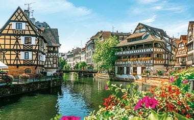 A view down a canal in Strasbourg, France A view down a canal in Strasbourg, France